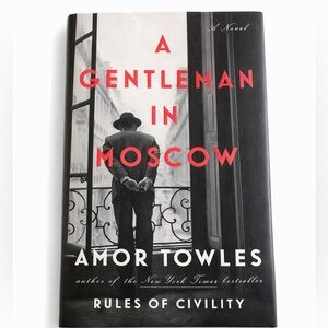 A Gentleman in Moscow by Amor Towles - Black & Red Hardcover Novel